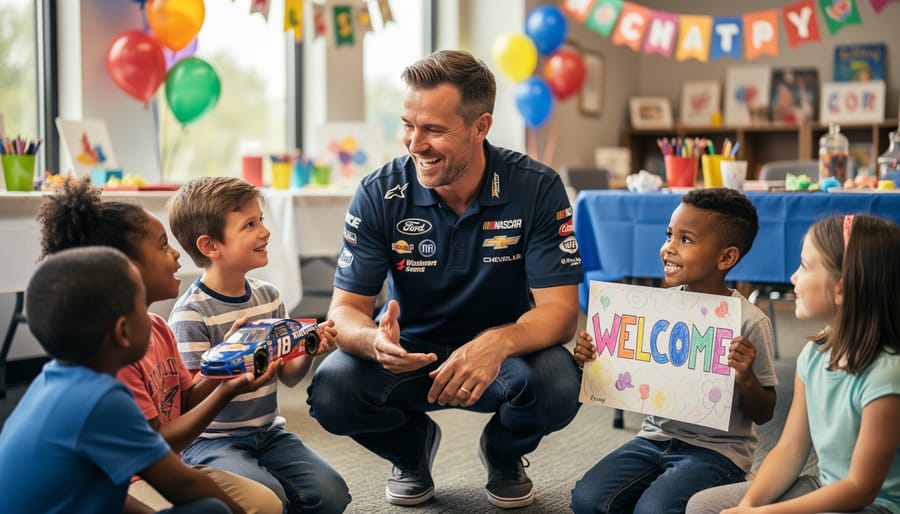 NASCAR driver kneeling to chat with children at a charity community event.